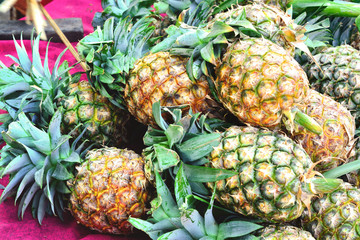 Pineapple on shelf in market