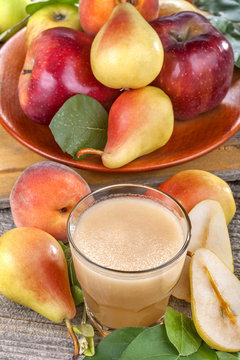 freshly squeezed juice made from organic and healthy pears, apples and peaches