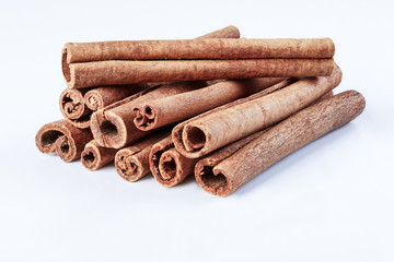 Cinnamon, spice, on a white surface, close-up.