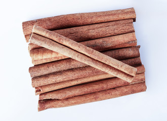 Cinnamon, spice, on a white surface, close-up.