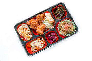 Japan Food set of chicken fried and other in a box isolated on w