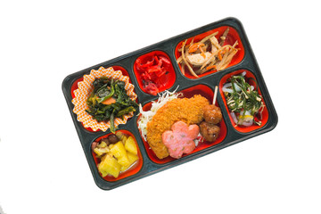 Japan Food set of fish fritter and other in a box isolated on wh