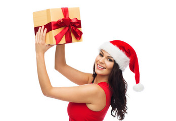 beautiful sexy woman in santa hat with gift box