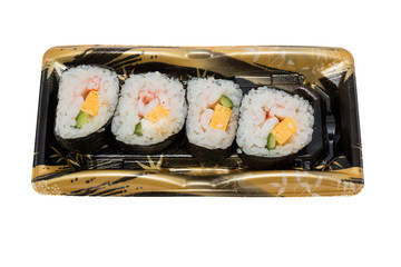 Sushi roll lined in the tray isolated on white background.