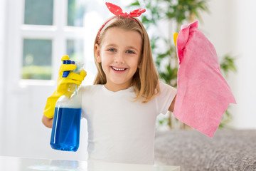 Happy smiling cute girl successful doing housework obligations