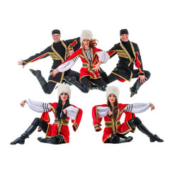 Fototapeta na wymiar dancer team wearing a folk Caucasian highlander costumes jumping