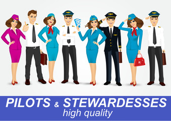 set of pilots and two stewardesses in uniform