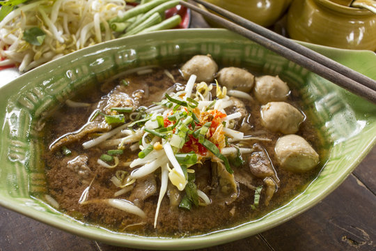 Thai noodle soup. Serve with Basil, bean Sprouts. (Kuay Tiew Ruer)
Noodle and casseroled beef  - Thailand food