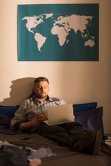 Fototapeta premium Lonely male using laptop