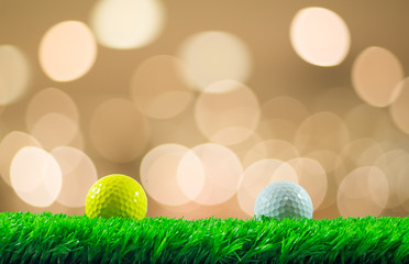 Golf balls on grass