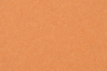 Embossed cardboard background, brown color, close up
