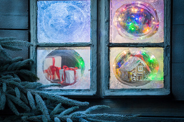 Christmas from outside view from the frozen window