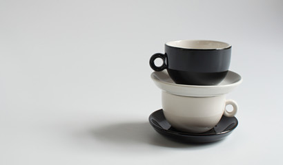 Black and white small cups