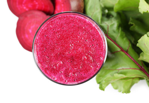 Glass of beet juice with vegetables close up