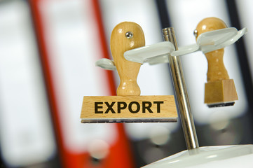 Export markiert auf Holzstempel im Büro