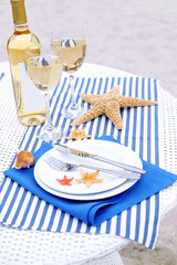 Table setting decorated in marine style