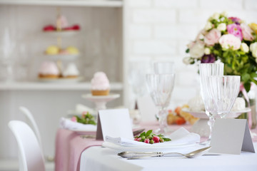 Beautiful served table for wedding or other celebration in restaurant