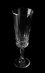Empty champagne glass on black background