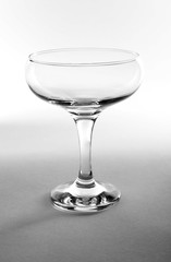 Empty cocktail glass isolated on white