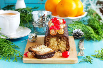 Chocolate cake with candied fruit for Christmas.