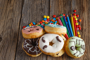 Halloween donuts on wooden table
