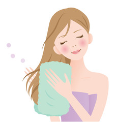 髪を乾かす女性