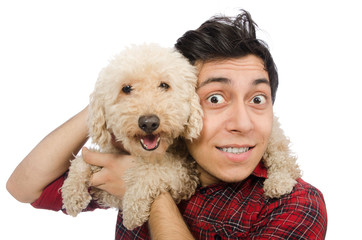 Young man with dog isolated on white
