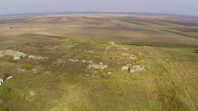 The ruins of the ancient Geto-Dacian settlement Dinogetia located on the right bank of the Danube (aerial view) in Dobrogea, Romania
