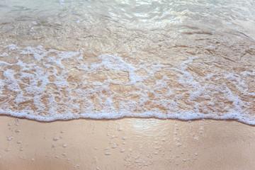 Fototapeta na wymiar Sand beach with wave of the sea.