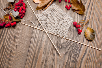 beige knitting and berries