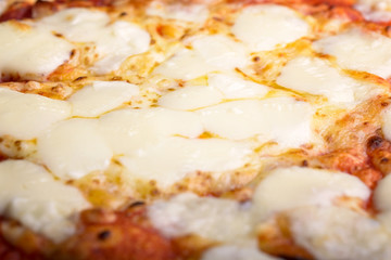 Obraz na płótnie Canvas macro pizza tomato, mozzarella and scamorza