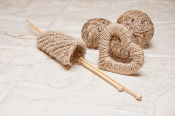 beige knitting and jewelry made of thread