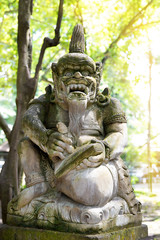 Stutue in Sacred Monkey Forest, Ubud, Bali, Indonesia