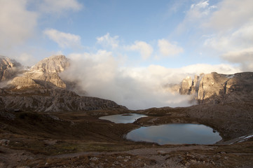 Fototapeta premium Cime di Lavaredo or Drei Zinnen / The Tre Cime di Lavaredo are three distinctive battlement-like peaks, in the Dolomites.