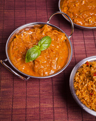 Chicken Tikka Masala Curry on Rattan Background