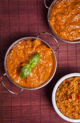 Chicken Tikka Masala Curry on Rattan Background