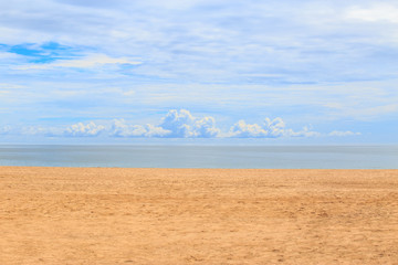 Sand beach at sea with blue sky and cloud.