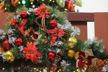Fototapeta na wymiar A hung up Christmas wreath decoration