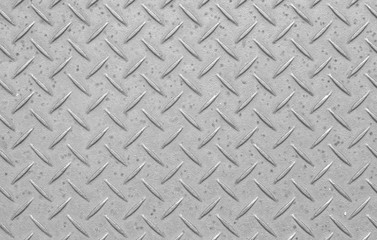 Metal diamond floor plate texture and background seamless