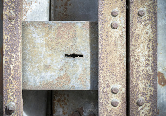 Old rusty padlock of the old sliding door