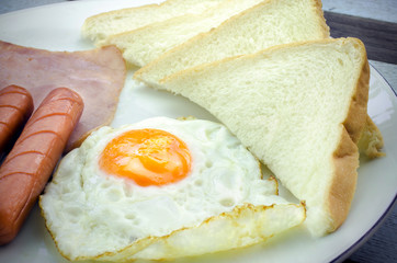 Breakfast set on wooden table background