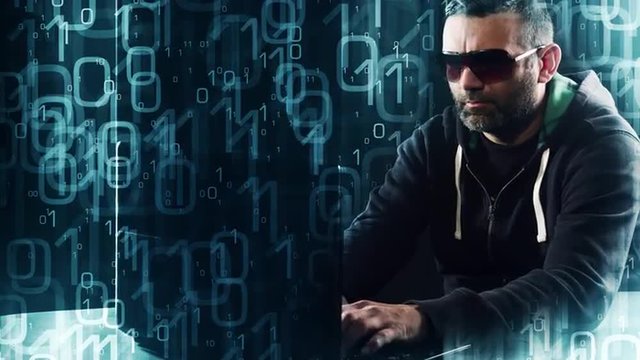 Hacker typing on laptop computer keyboard animated binary code background 4k