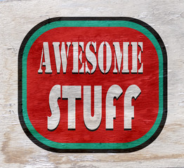 awesome stuff sign on wood texture