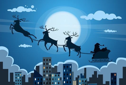 Santa Claus Sleigh Reindeer Fly Sky over City Skyscraper Night View Cityscape Snow Skyline Christmas New Year Card