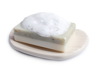 Soap with foam isolated on white