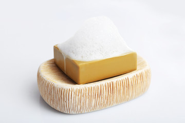 Soap with foam isolated on white