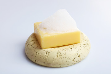 Soap with foam isolated on white