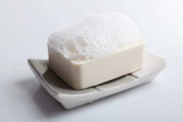 Obraz na płótnie Canvas Soap with foam isolated on white