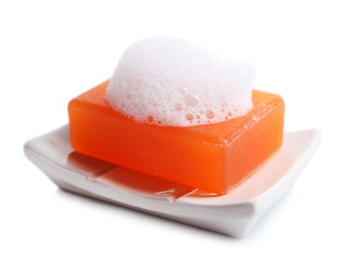 Soap with foam isolated on white