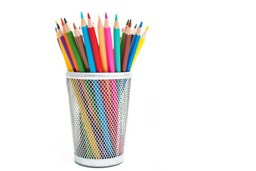 Obraz premium Colored pencils in a pencil case on white background